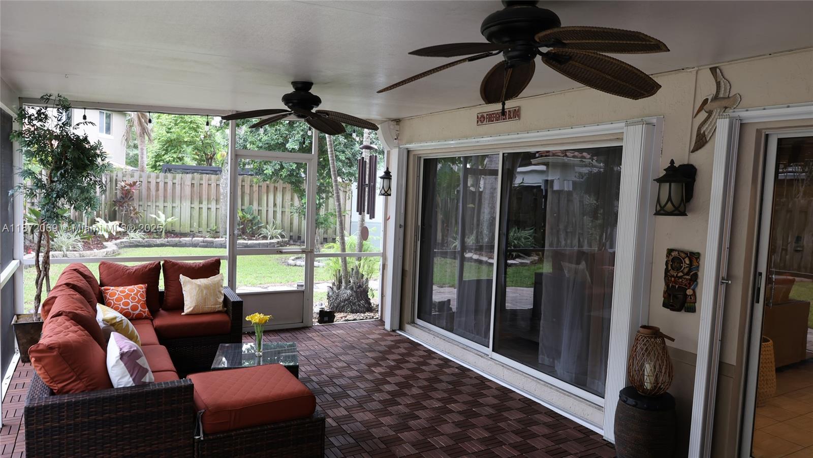 11251 Reveille Road Cooper City, FL 33026 - Photo 46 of 82 a bedroom with furniture ceiling fan and window