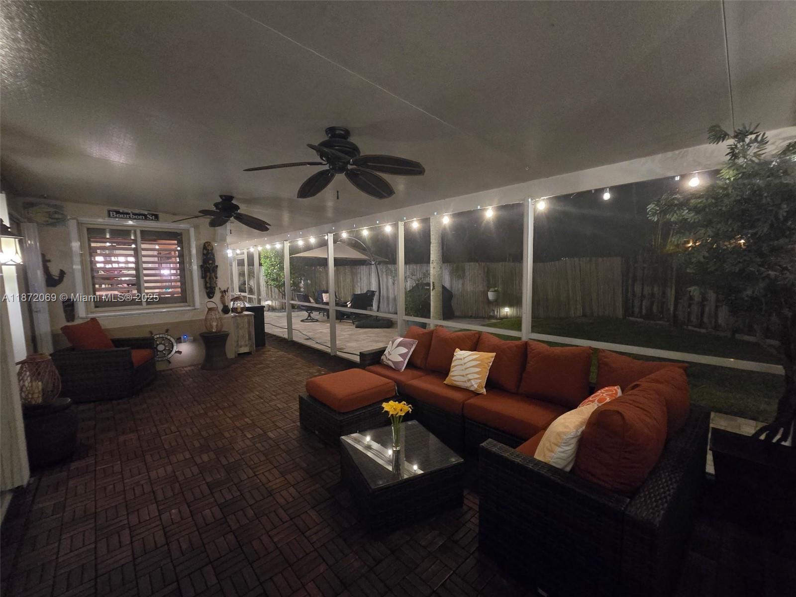 11251 Reveille Road Cooper City, FL 33026 - Photo 79 of 82 a living room with furniture and a wooden floor