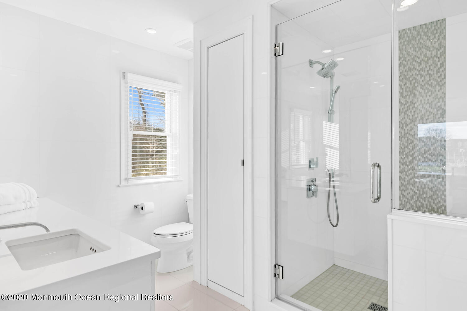 1 Horatius Way Rumson, NJ 07760 - Photo 13 of 24 a bathroom with a toilet sink a shower and a mirror