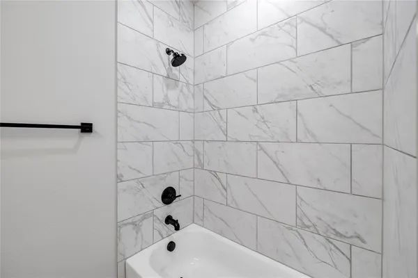 a bathroom with a bathtub