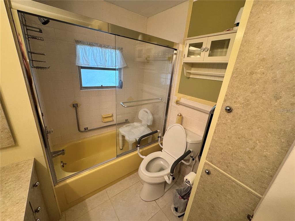 2331 Belleair Road, Unit LOT 237 Clearwater, FL 33764 - Photo 20 of 33 a bathroom with a sink a toilet and shower