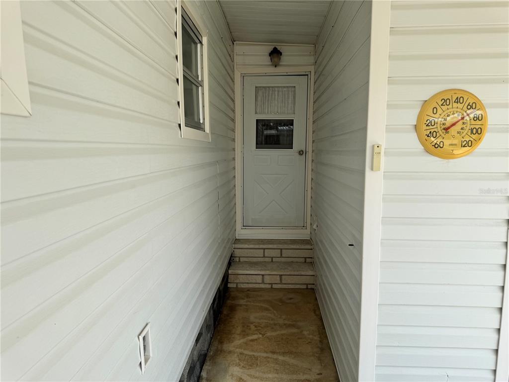 2331 Belleair Road, Unit LOT 237 Clearwater, FL 33764 - Photo 21 of 33 a view of a pathway of a house