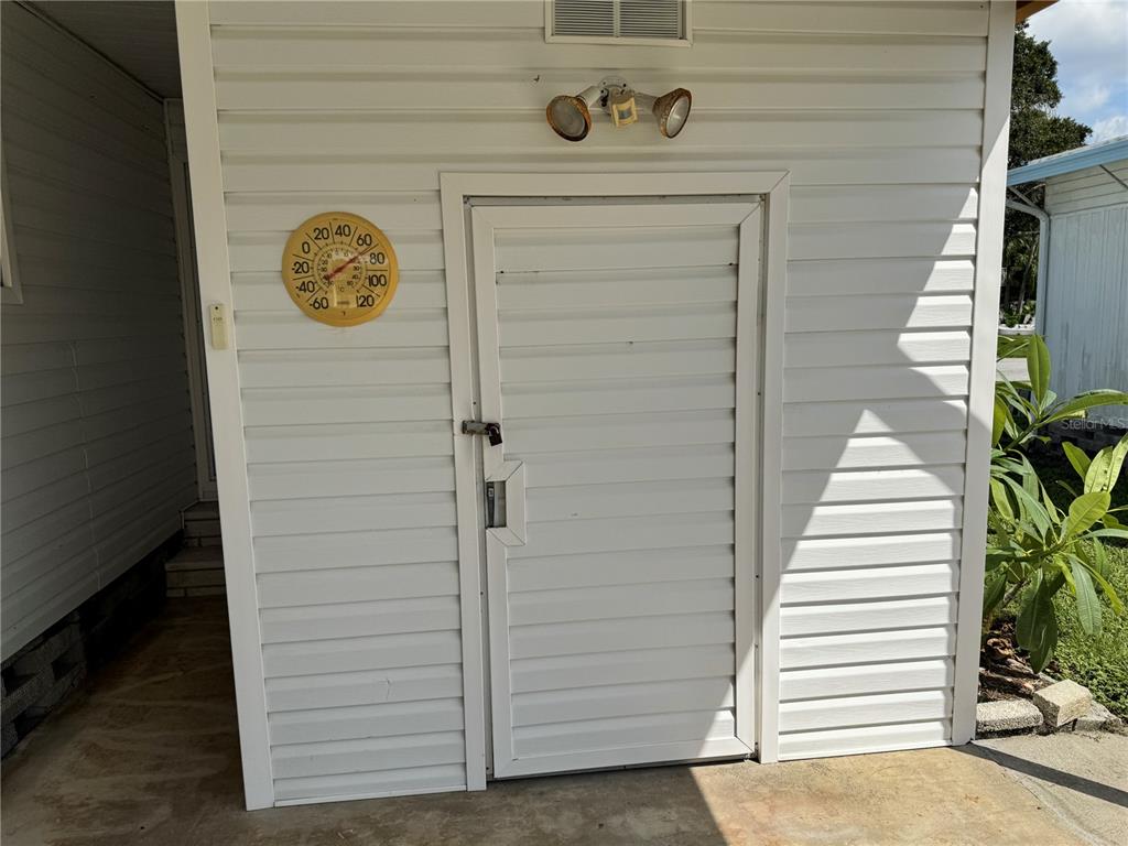 2331 Belleair Road, Unit LOT 237 Clearwater, FL 33764 - Photo 22 of 33 a view of a door of the house