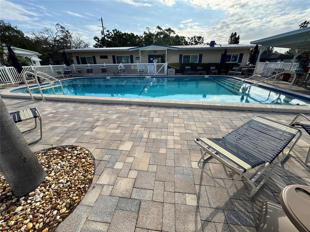 2331 Belleair Road, Unit LOT 237 Clearwater, FL 33764 - Photo 26 of 33 a front view of a house with a yard