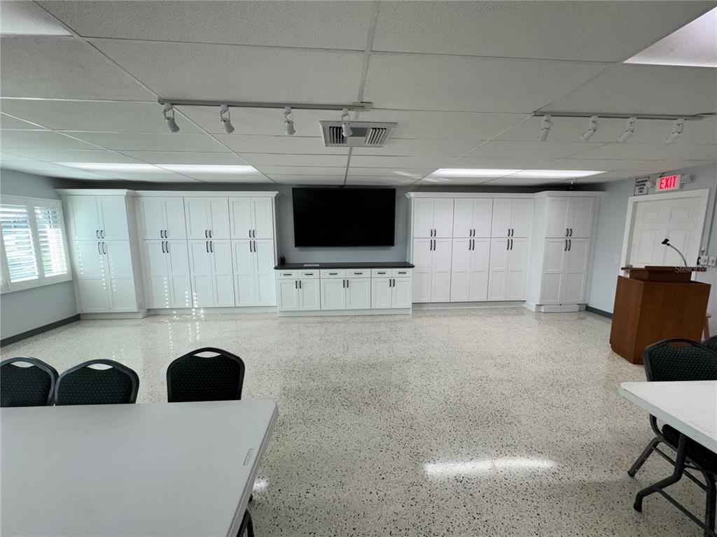 2331 Belleair Road, Unit LOT 237 Clearwater, FL 33764 - Photo 27 of 33 a living room with furniture and a flat screen tv