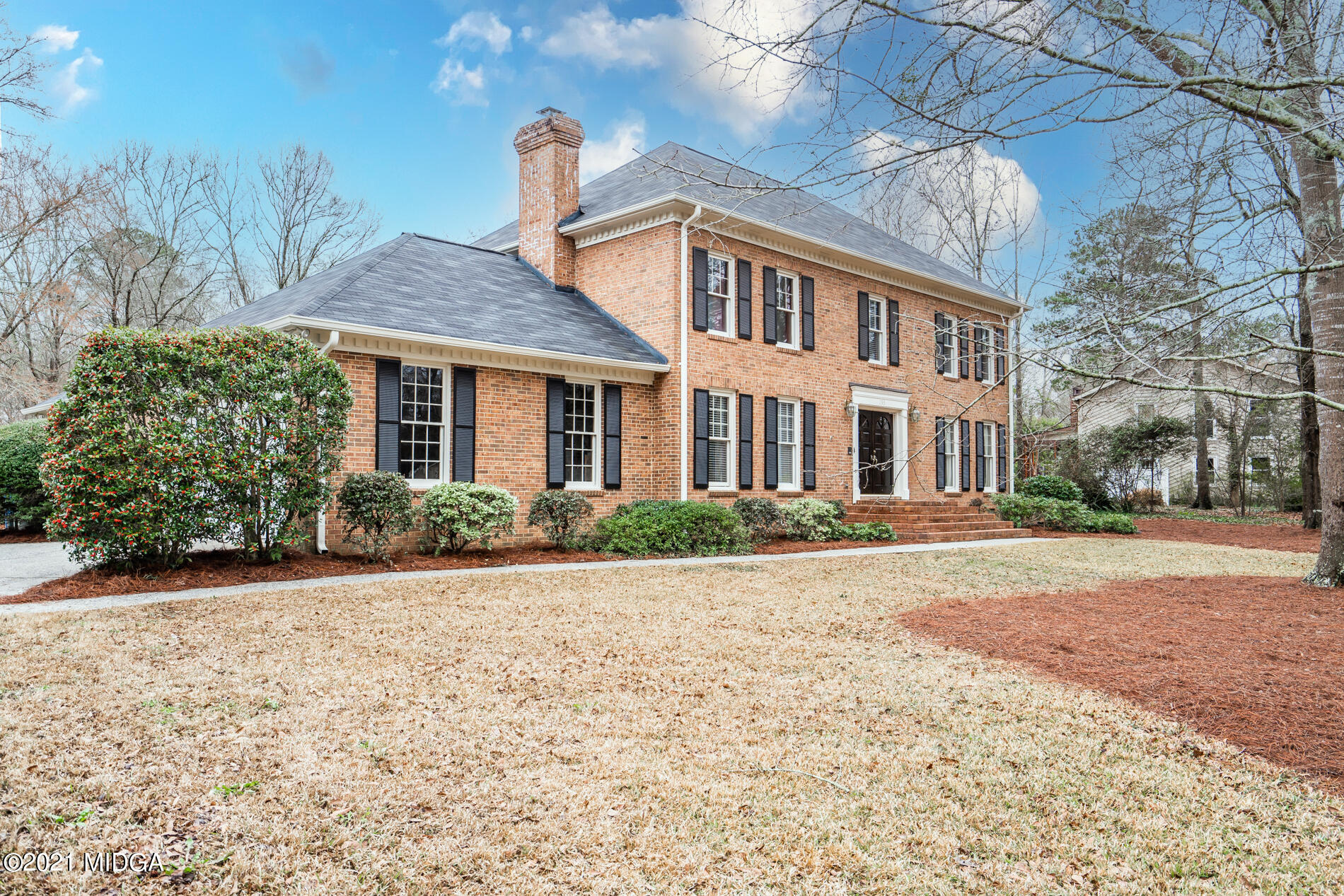 155 Castlegate Road Macon, GA 31210 - Photo 1 of 34 a front view of a house with a yard