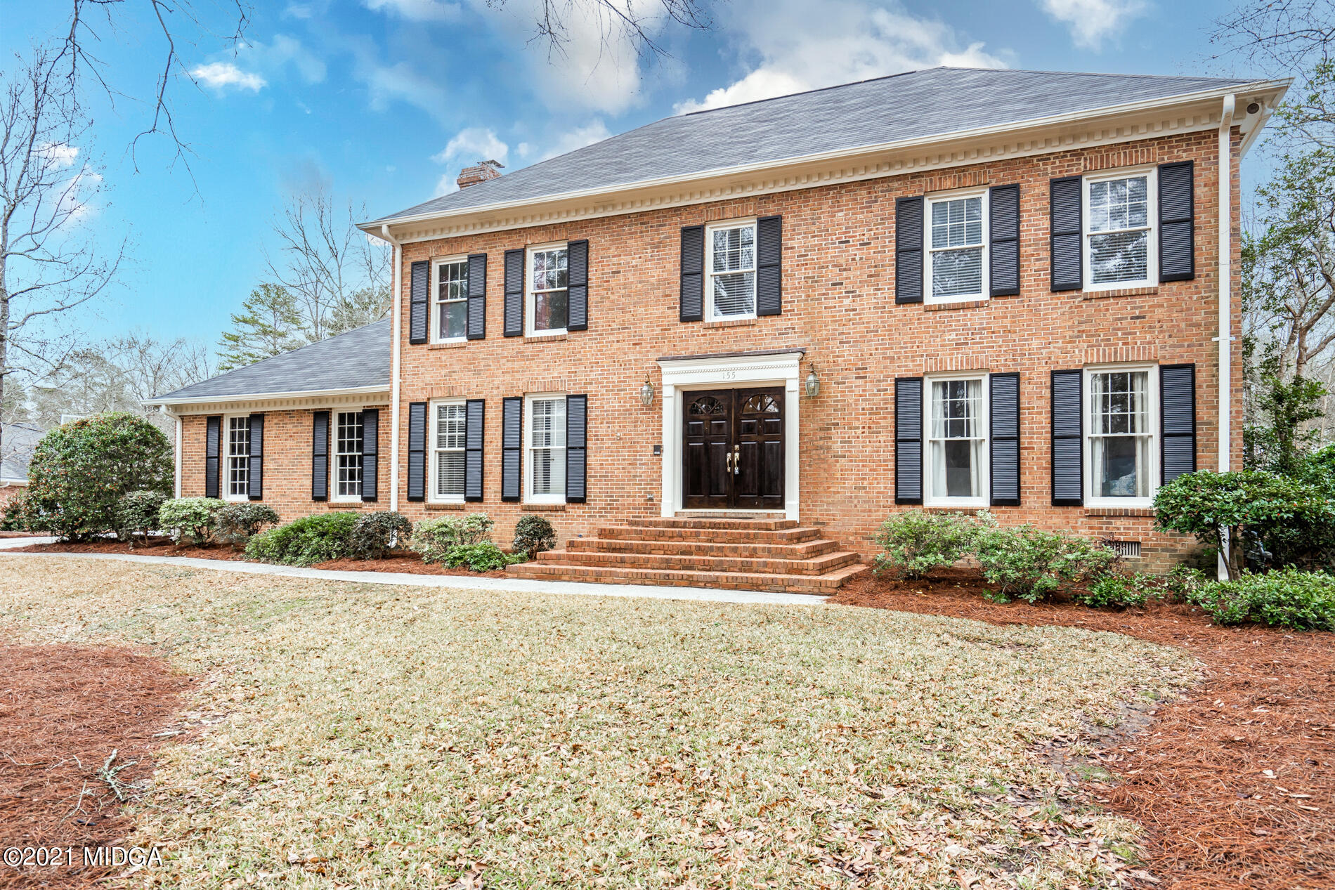 155 Castlegate Road Macon, GA 31210 - Photo 2 of 34 a front view of a house with a yard
