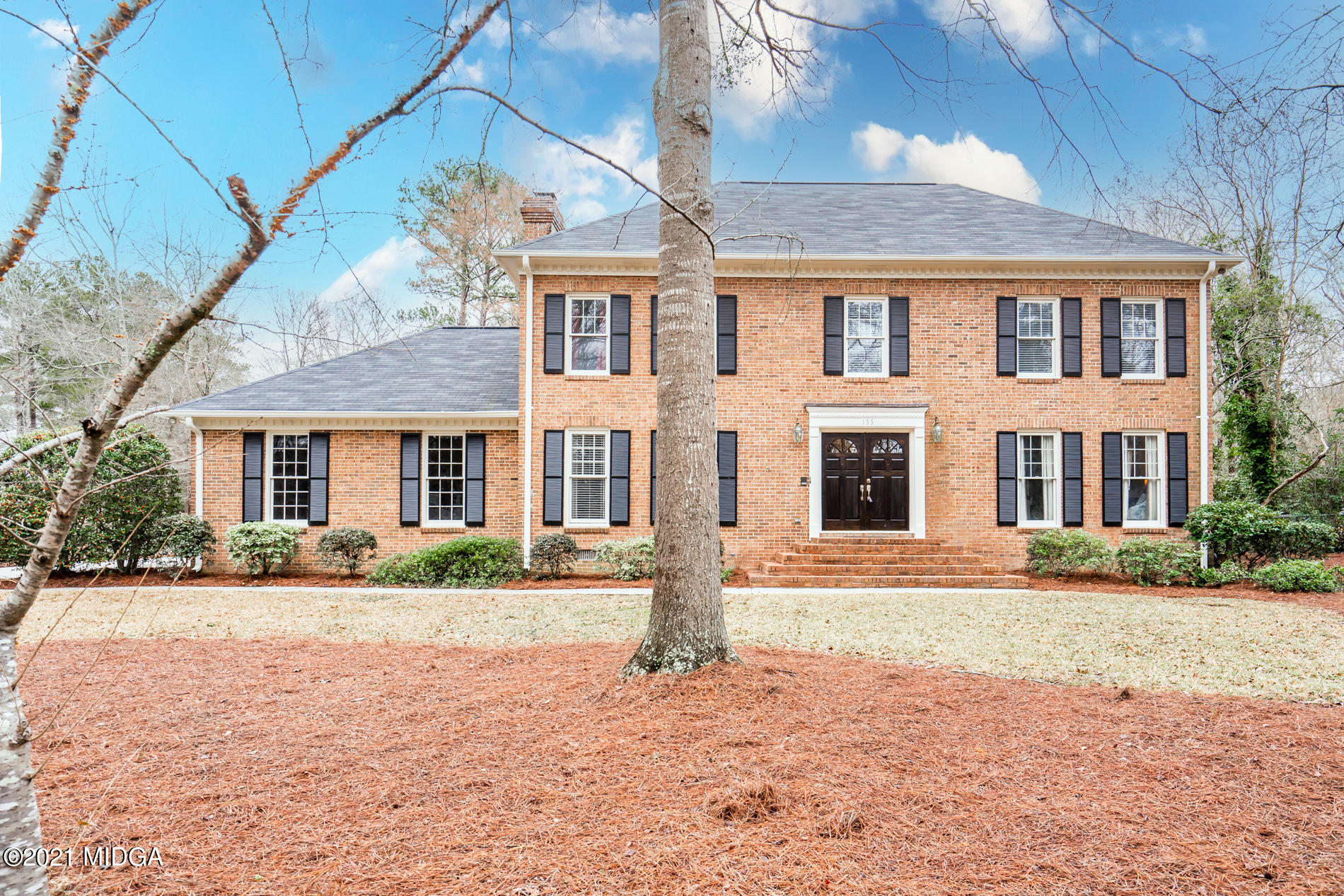 155 Castlegate Road Macon, GA 31210 - Photo 3 of 34 a front view of a house with a yard