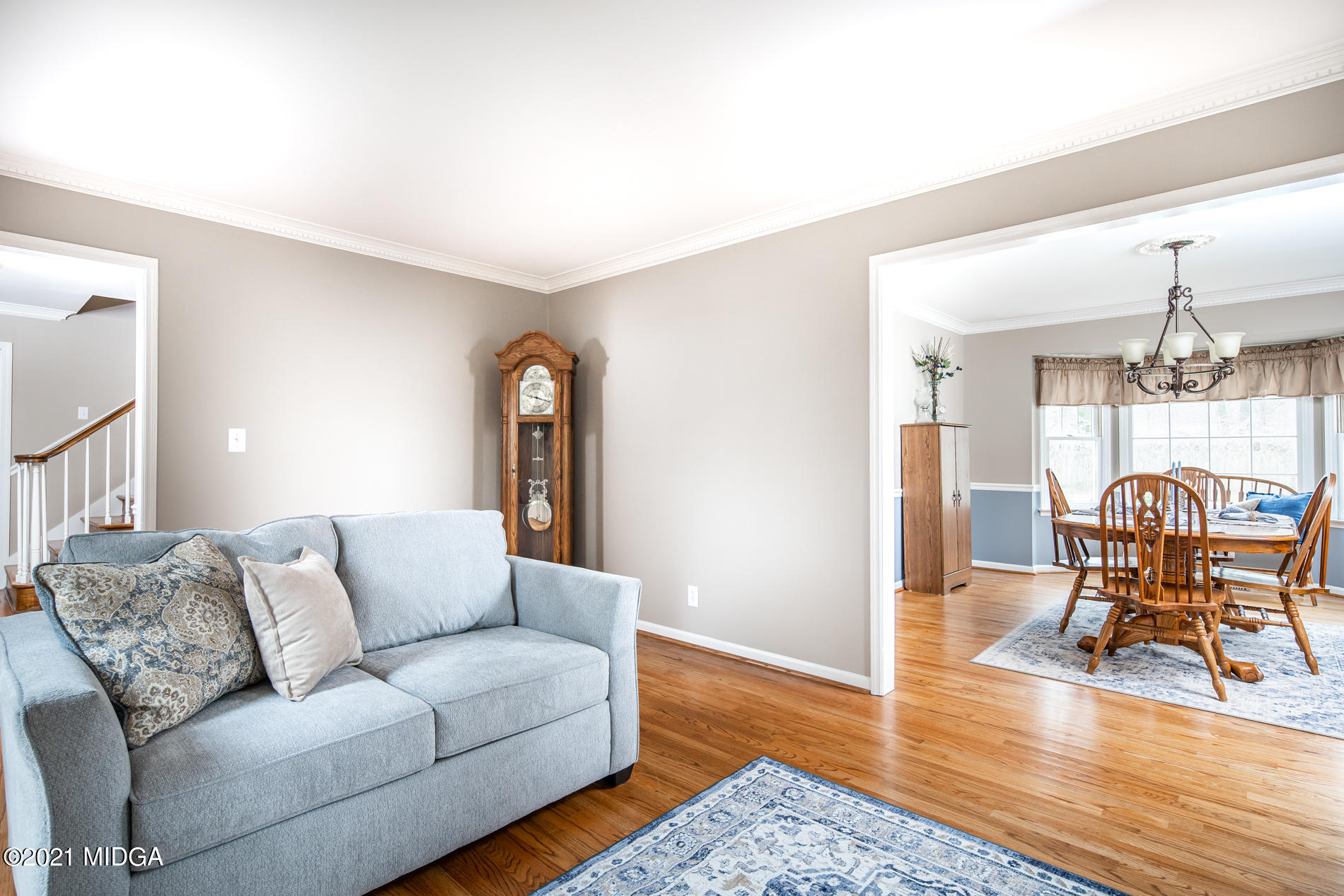 155 Castlegate Road Macon, GA 31210 - Photo 22 of 34 a living room with furniture and a wooden floor
