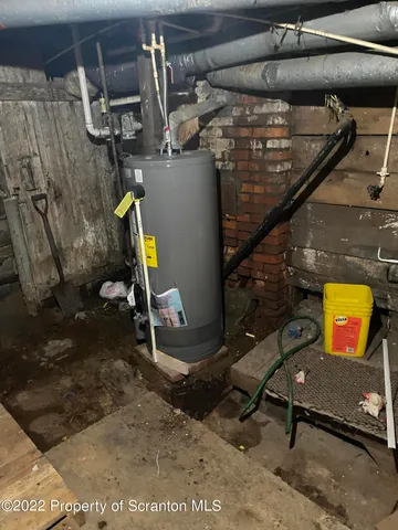 a front view of a house with parking space