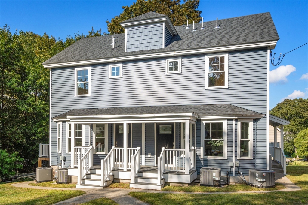 28 Waltham Street, Unit B Maynard, MA 01754 - Photo 17 of 17 a view of a house with a swimming pool