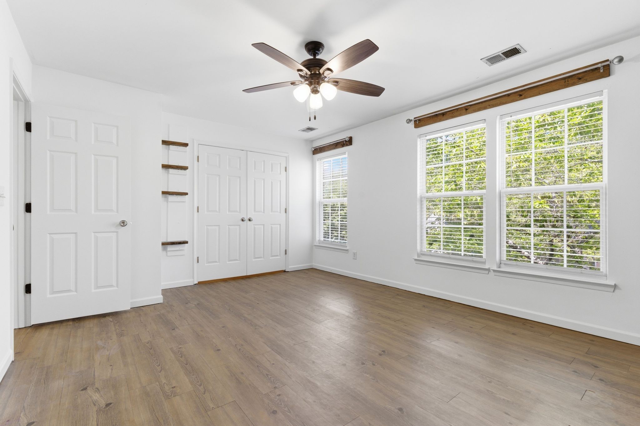 3401 Anderson Road, Unit 4 Antioch, TN 37013 - Photo 43 of 55 a view of an empty room with a window and wooden floor