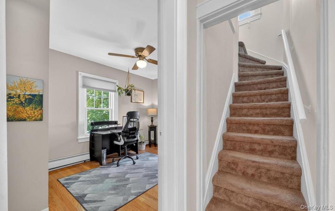 34 Ridge Road Croton-on-Hudson, NY 10520 - Photo 21 of 35 First floor bedroom and stairway to the upper level adjacent to the kitchen