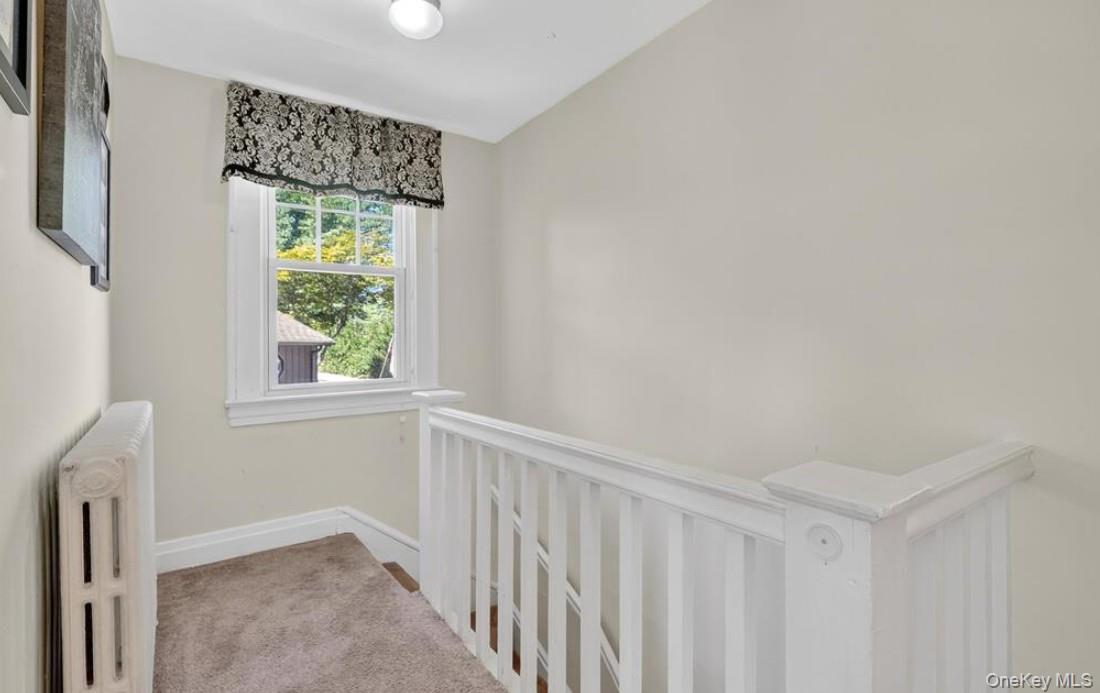 34 Ridge Road Croton-on-Hudson, NY 10520 - Photo 22 of 35 Second floor landing with radiator and carpet