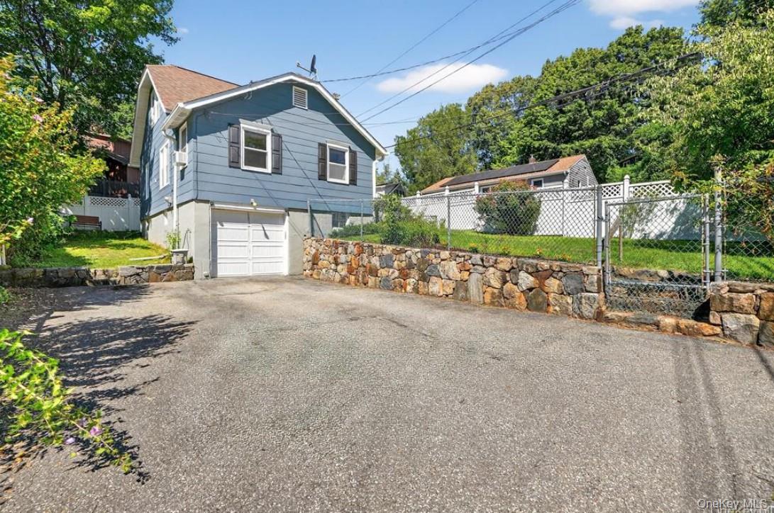 34 Ridge Road Croton-on-Hudson, NY 10520 - Photo 3 of 35 Driveway parking for four cars, plus garage plus on street parking ready for all your guests at for your housewarming party
