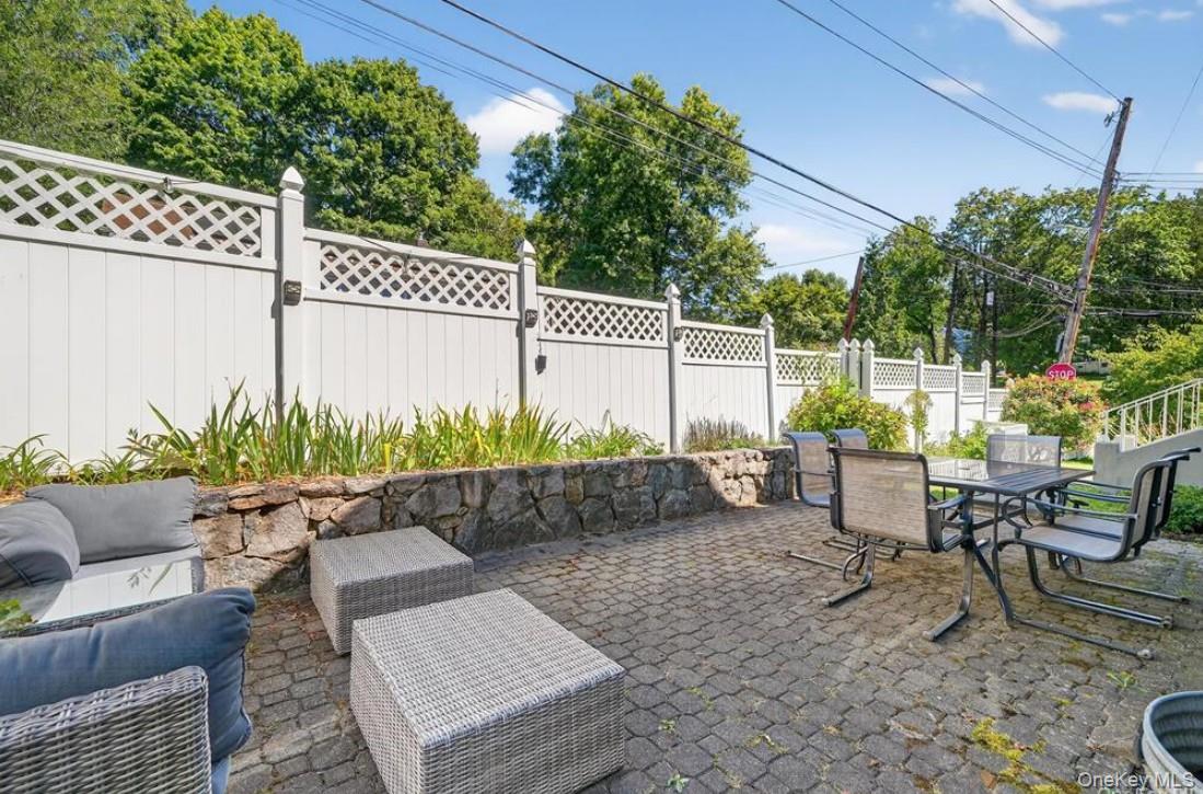 34 Ridge Road Croton-on-Hudson, NY 10520 - Photo 34 of 35 Fenced yard with a patio area, outdoor dining space, and an outdoor living space