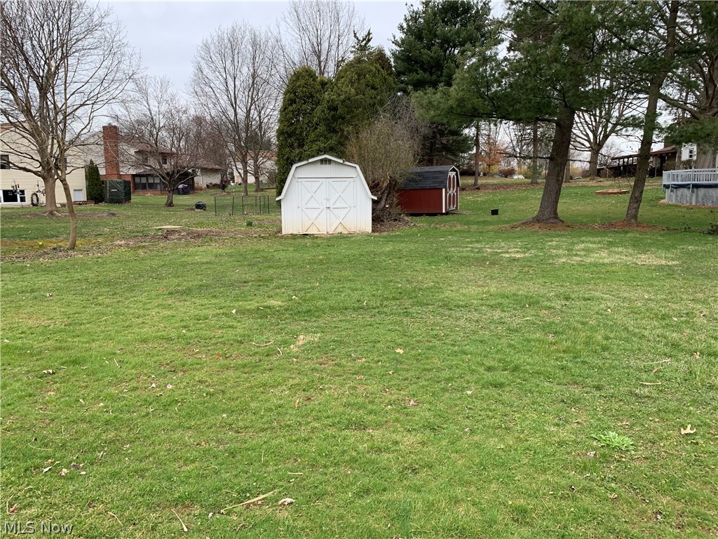 3303 Wright Road Northwest Uniontown, OH 44685 - Photo 10 of 10 Back Yard and Shed