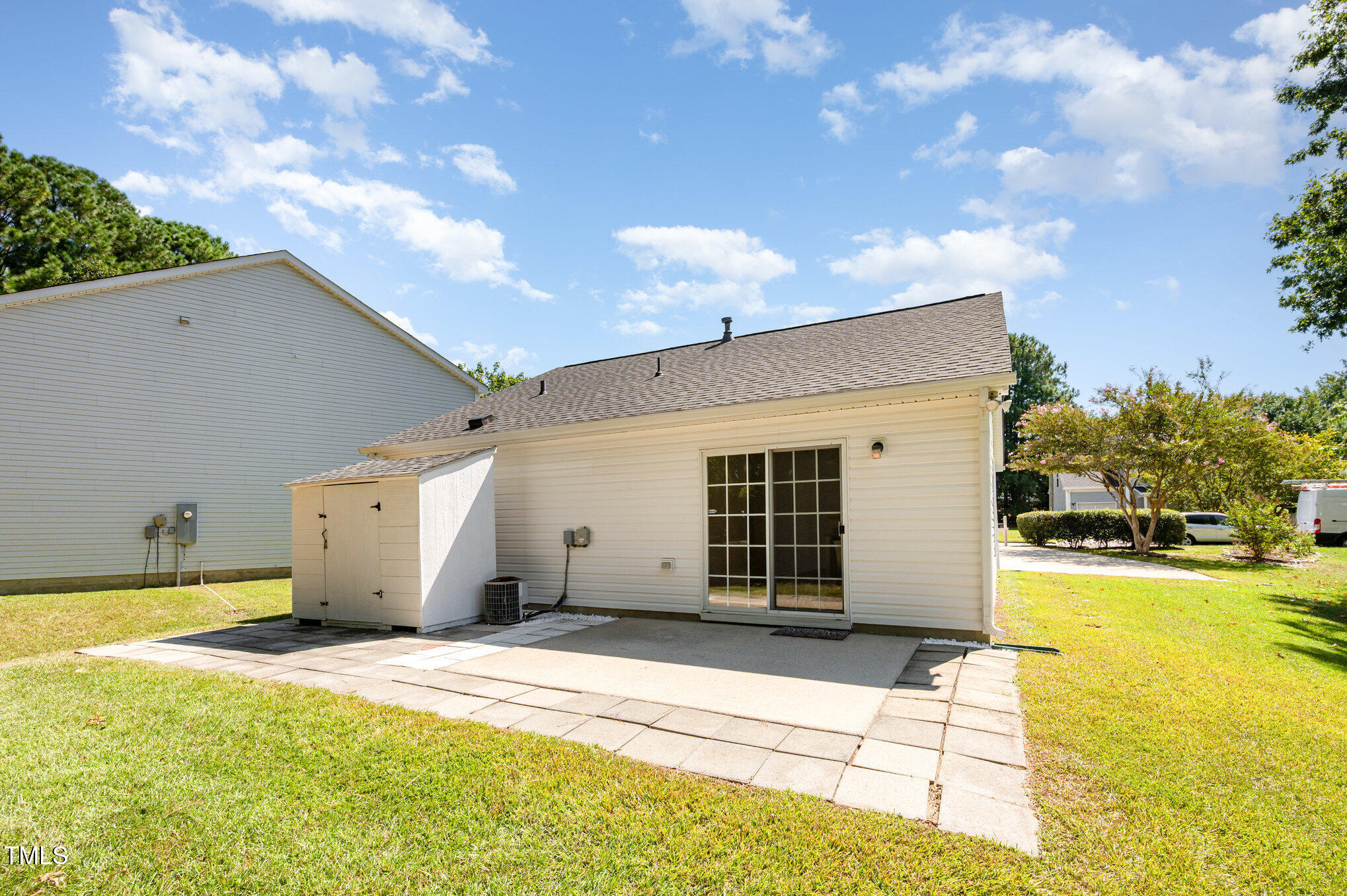 102 Checker Court Apex, NC 27502 - Photo 14 of 15 a view of a house with a swimming pool and sitting area