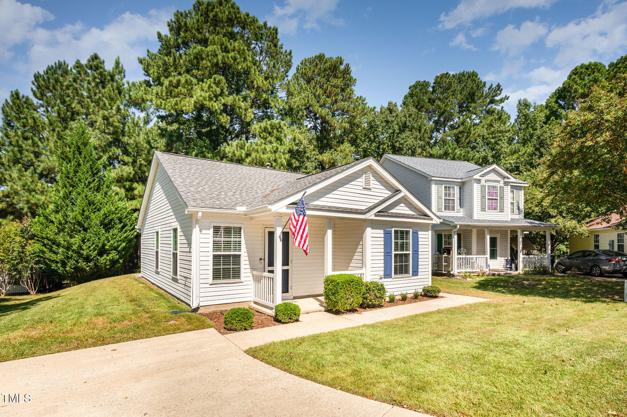 102 Checker Court Apex, NC 27502 - Photo 2 of 15 a front view of a house with a yard