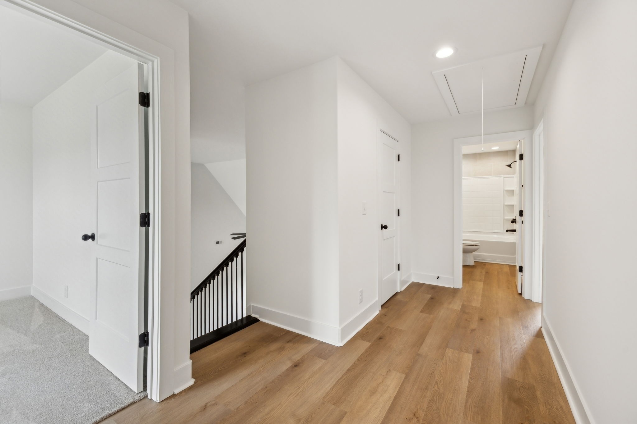 1075 Linder Ridge Road Indian Mound, TN 37079 - Photo 20 of 29 a view of a hallway with wooden floor and closet