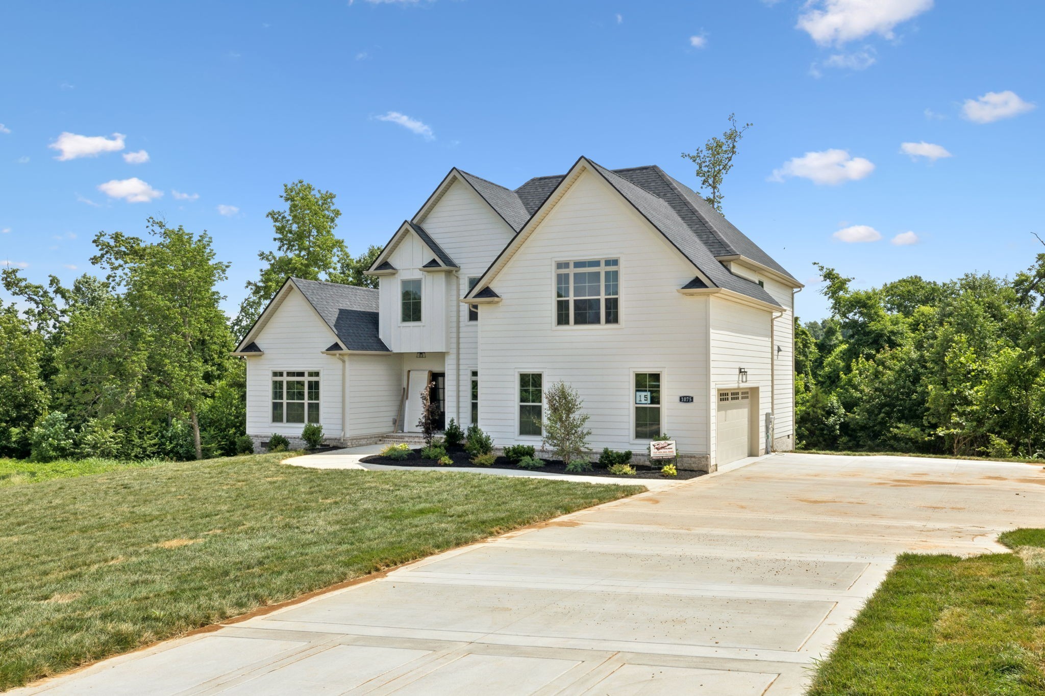 1075 Linder Ridge Road Indian Mound, TN 37079 - Photo 2 of 29 a front view of a house with a yard