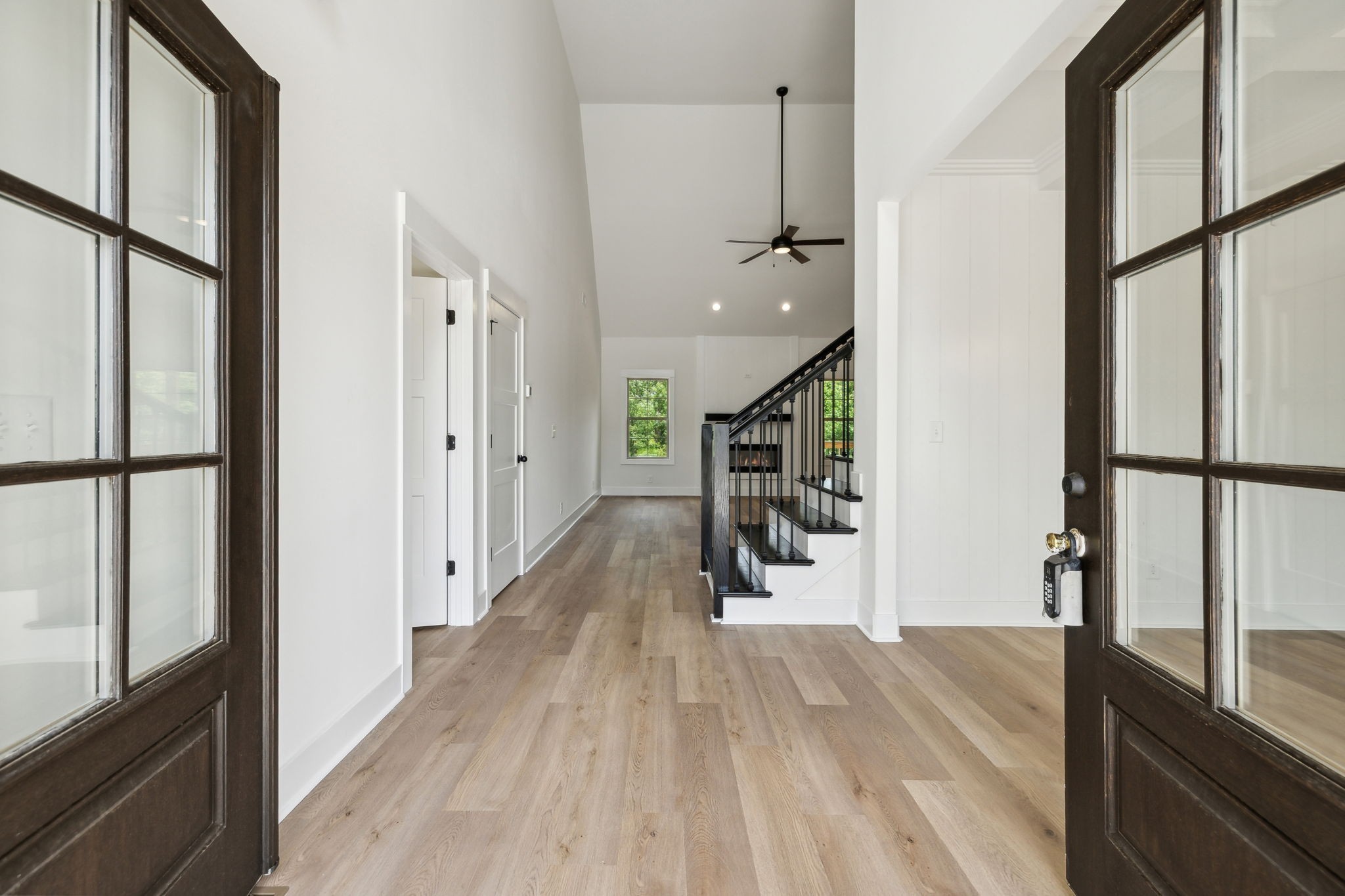 1075 Linder Ridge Road Indian Mound, TN 37079 - Photo 3 of 29 a view of hallway with wooden floor and staircase