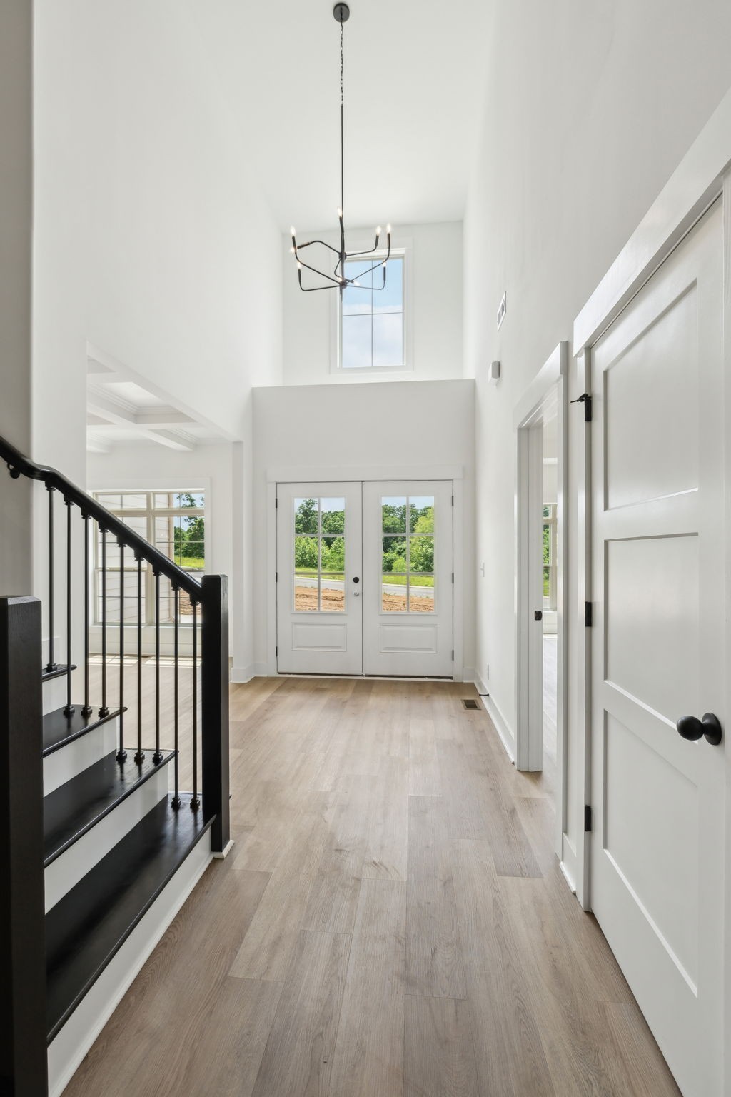 1075 Linder Ridge Road Indian Mound, TN 37079 - Photo 4 of 29 a view of a hallway with wooden floor and a window