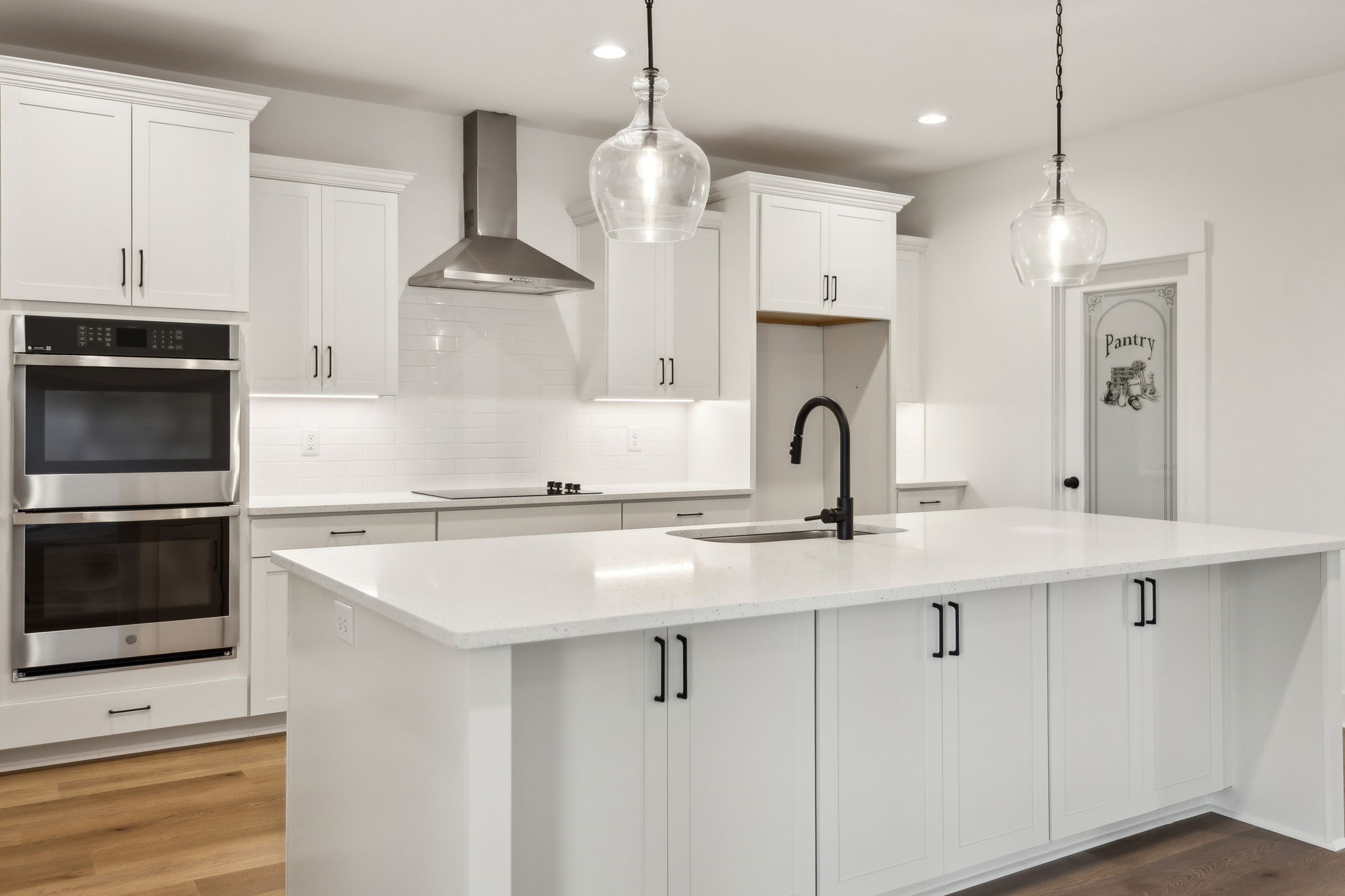 1075 Linder Ridge Road Indian Mound, TN 37079 - Photo 10 of 29 a kitchen with stainless steel appliances kitchen island a stove a sink and a refrigerator