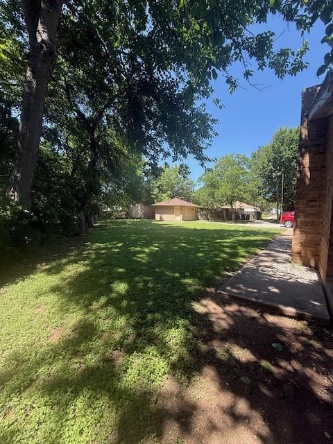 8761 South County Road Frisco, TX 75034 - Photo 15 of 19 a view of a trees with a yard