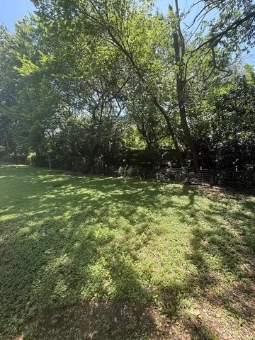 a view of outdoor space with a lake view