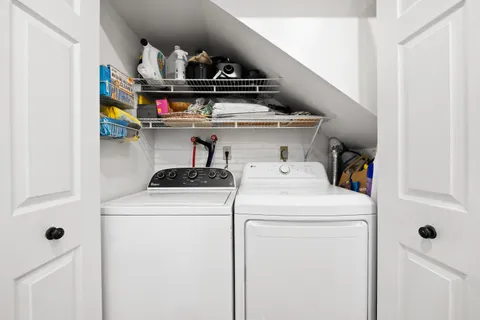 a utility room with dryer and washer