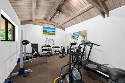 a view of a room with gym equipment