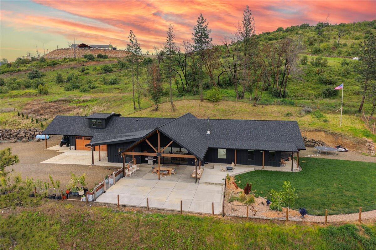 an aerial view of a house with garden