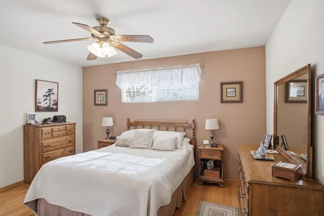 a bedroom with a bed and furniture