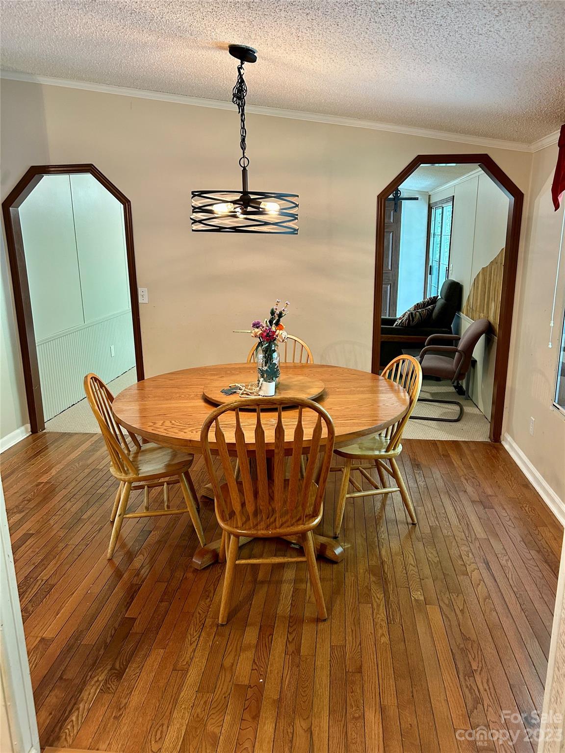 71 Bear Trail Fairview, NC 28730 - Photo 11 of 42 a dining room with furniture and wooden floor