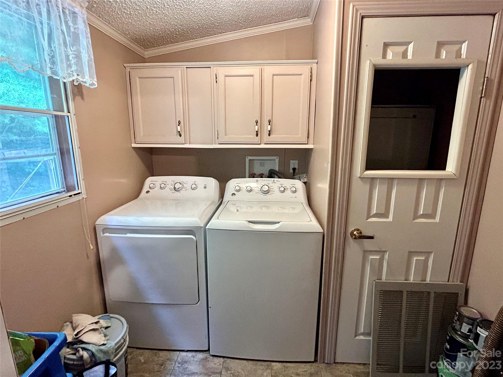 71 Bear Trail Fairview, NC 28730 - Photo 13 of 42 a utility room with dryer and washer