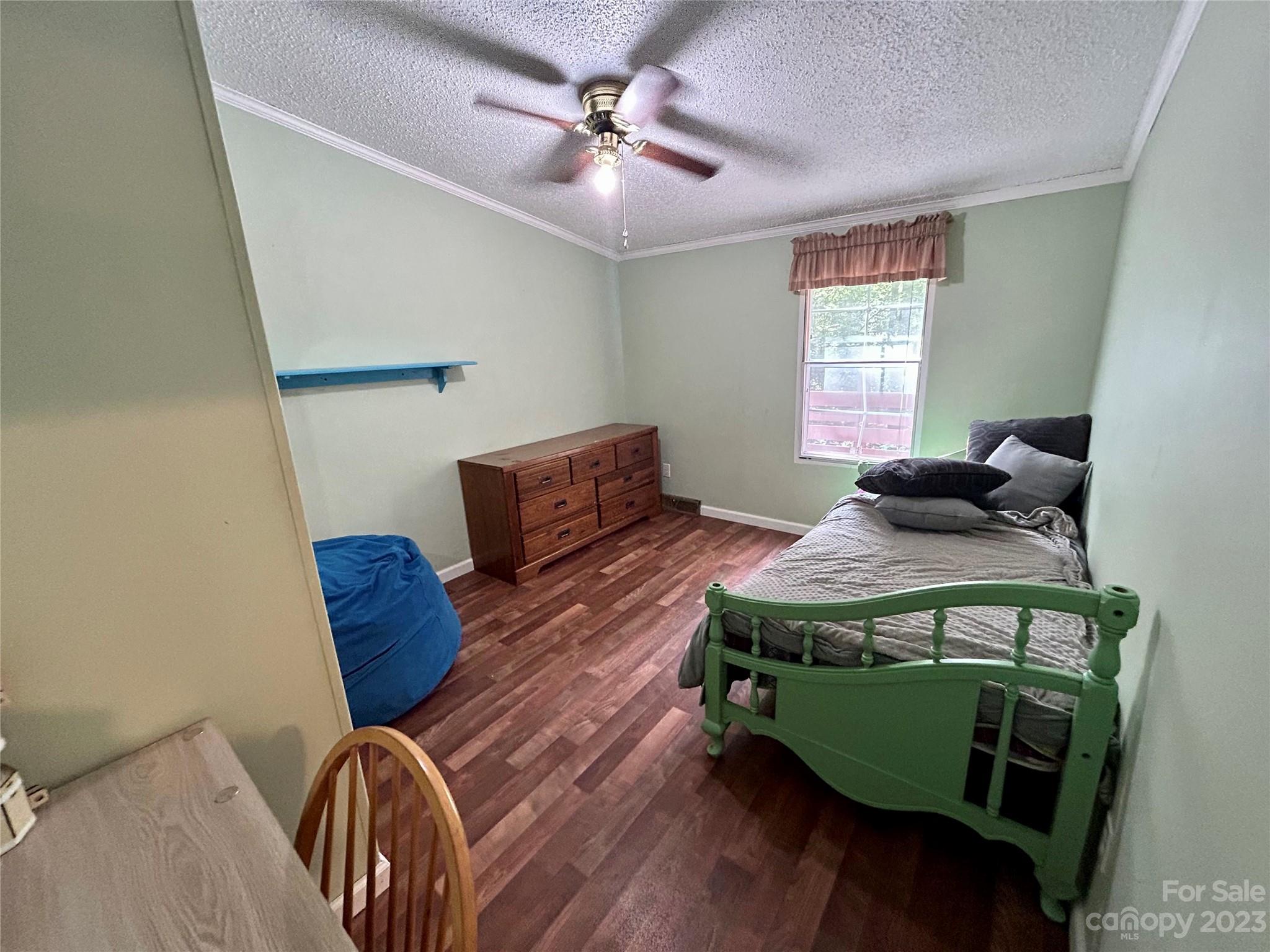 71 Bear Trail Fairview, NC 28730 - Photo 24 of 42 a bedroom with furniture and a window