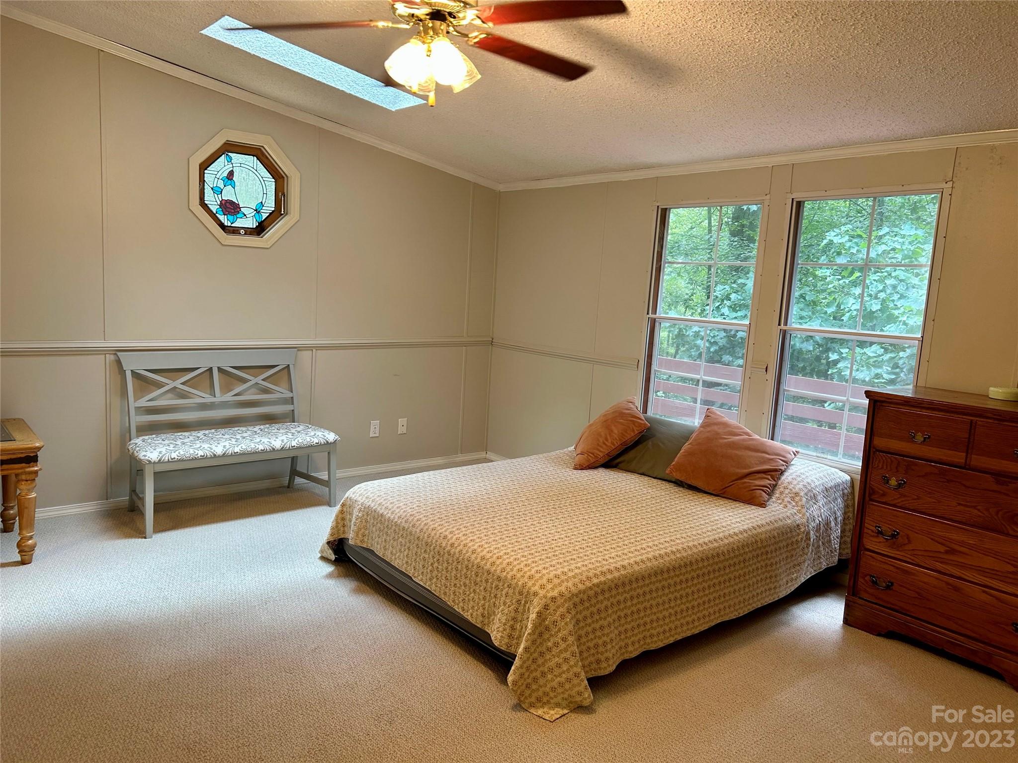 71 Bear Trail Fairview, NC 28730 - Photo 27 of 42 a bedroom with a bed and a window