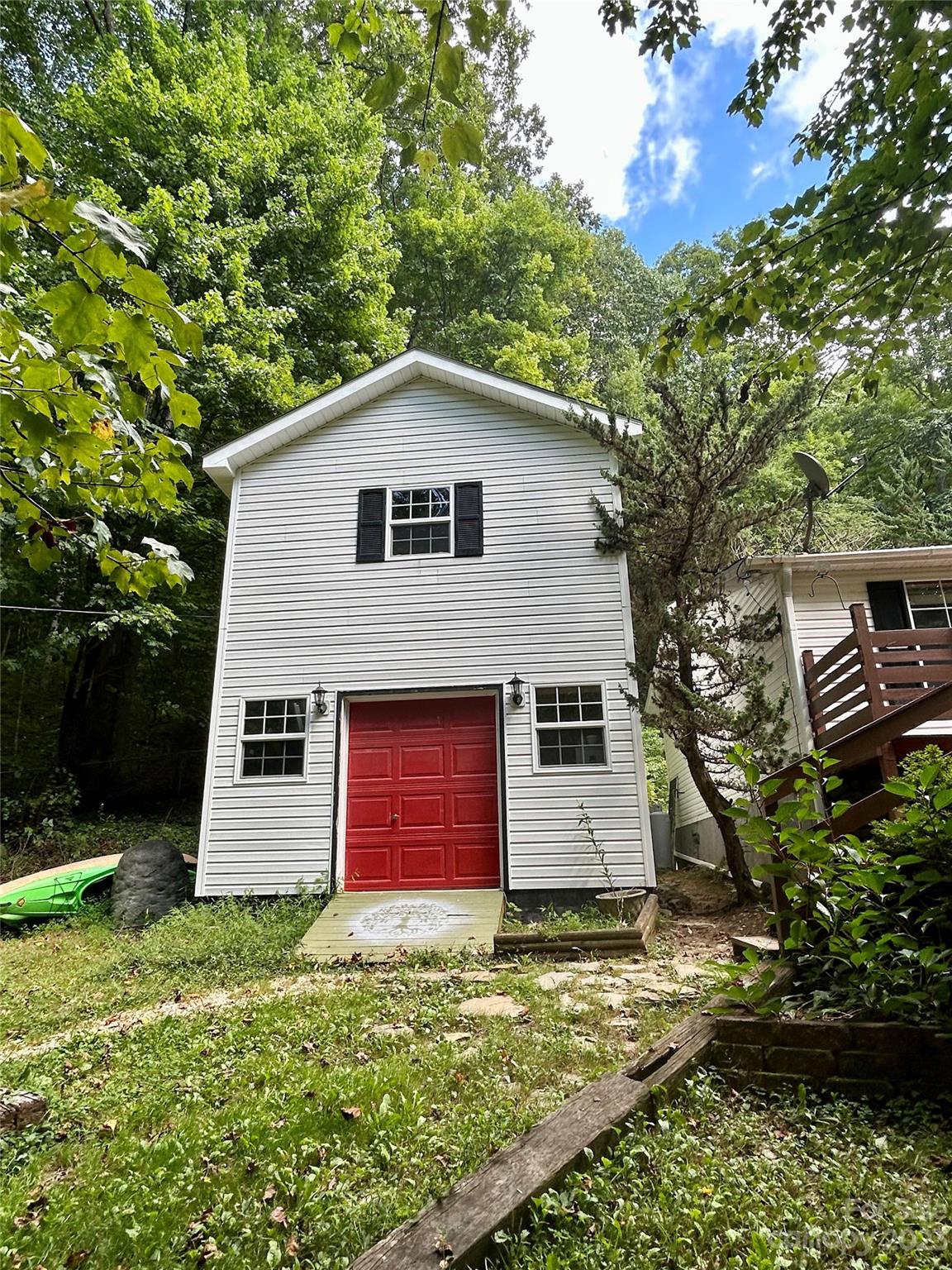 71 Bear Trail Fairview, NC 28730 - Photo 31 of 42 a view of a house with a yard