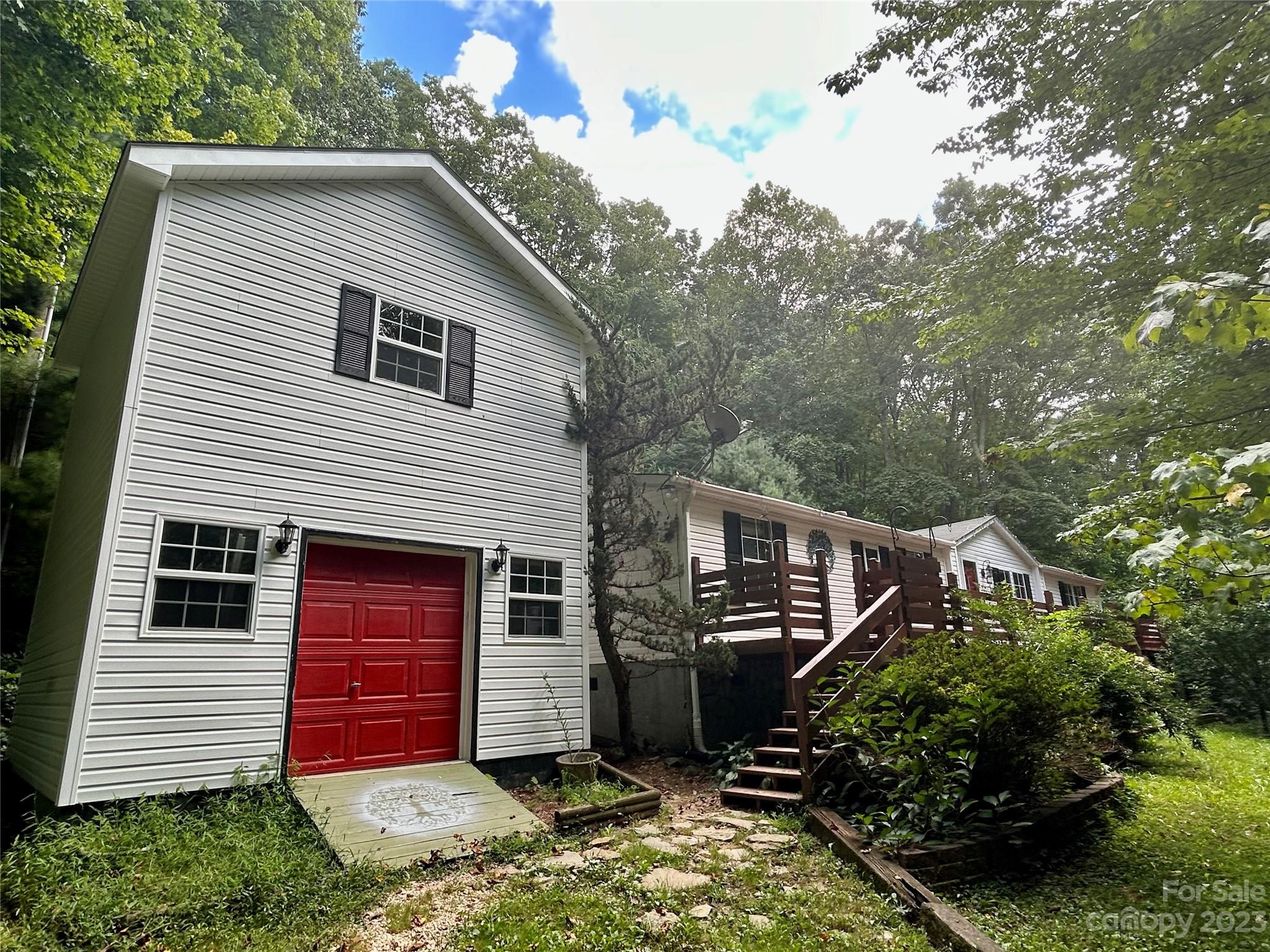 71 Bear Trail Fairview, NC 28730 - Photo 4 of 42 a view of a house with a yard