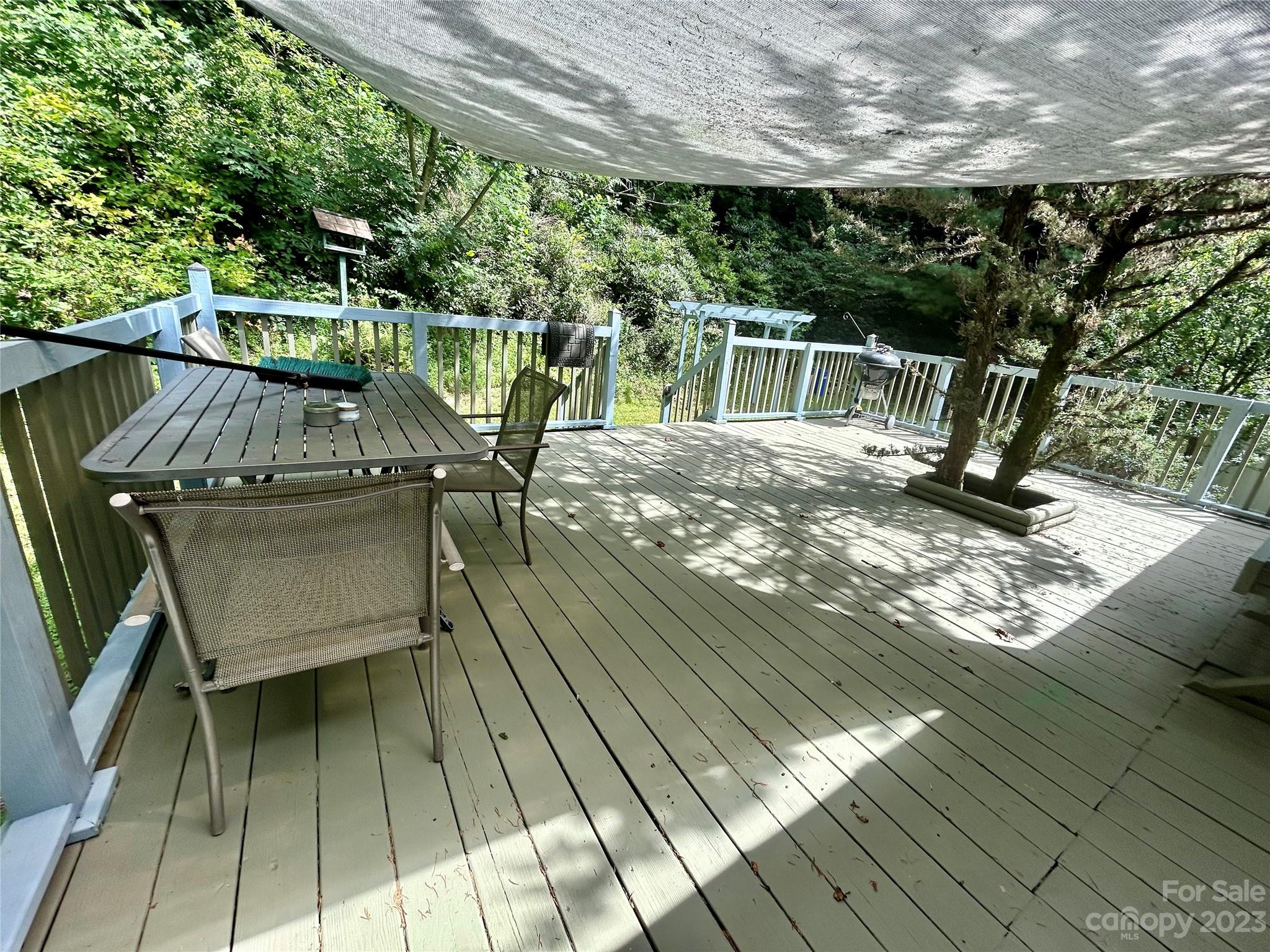 71 Bear Trail Fairview, NC 28730 - Photo 41 of 42 a view of balcony with wooden floor and outdoor seating