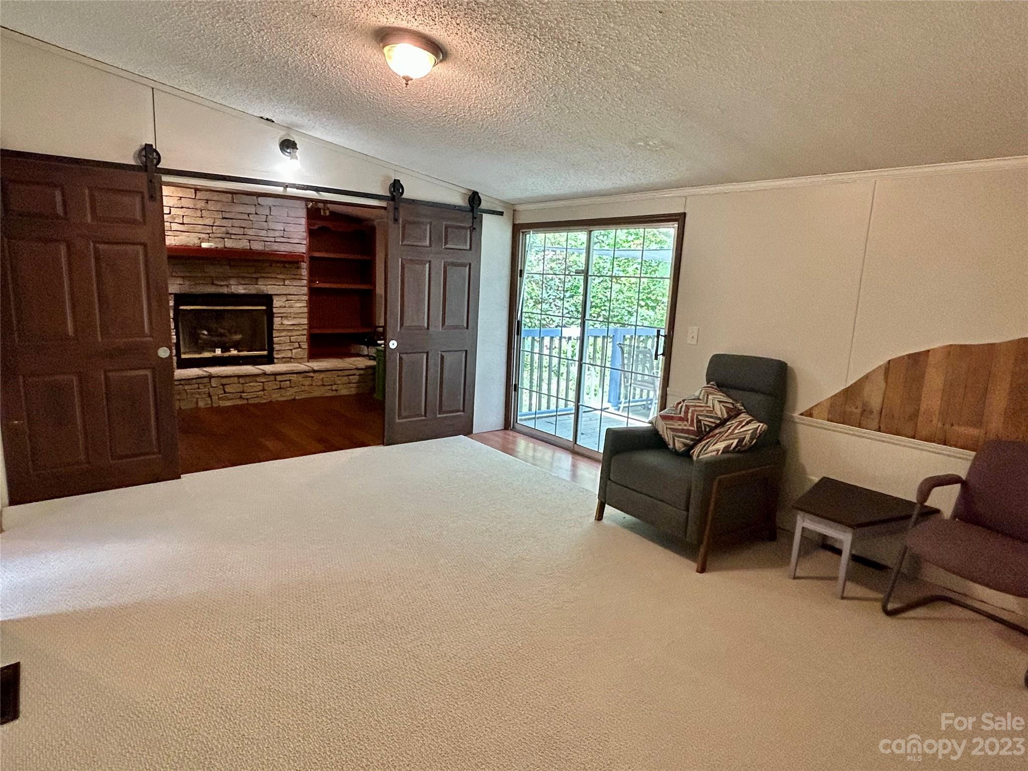 71 Bear Trail Fairview, NC 28730 - Photo 9 of 42 a bedroom with furniture and a window