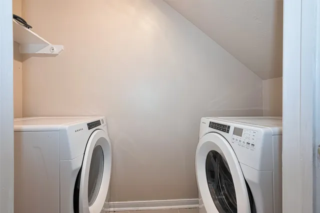 a utility room with dryer and washer