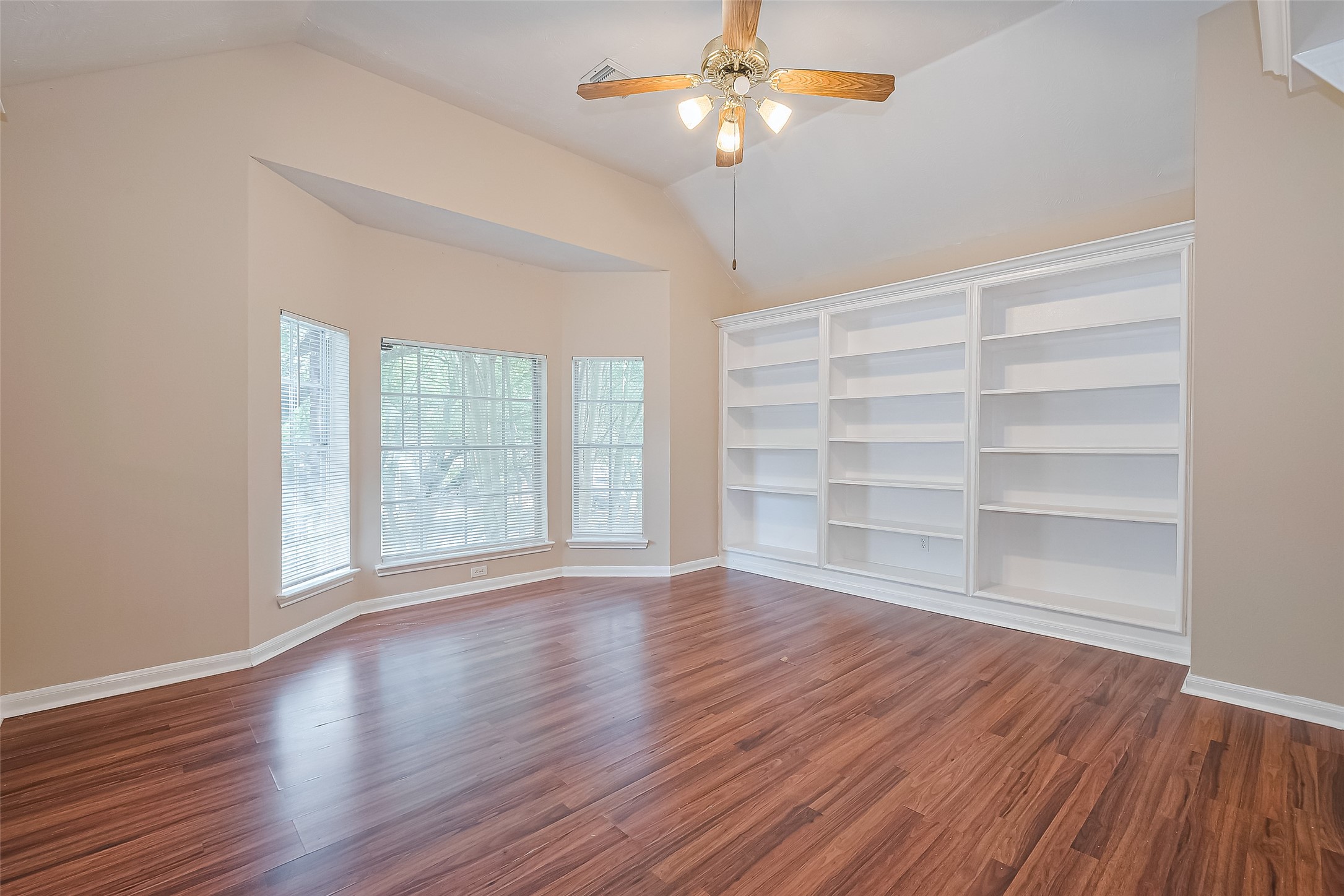 24310 Pepperrell Pl Street Katy, TX 77493 - Photo 19 of 35 a view of wooden floor and windows in a room