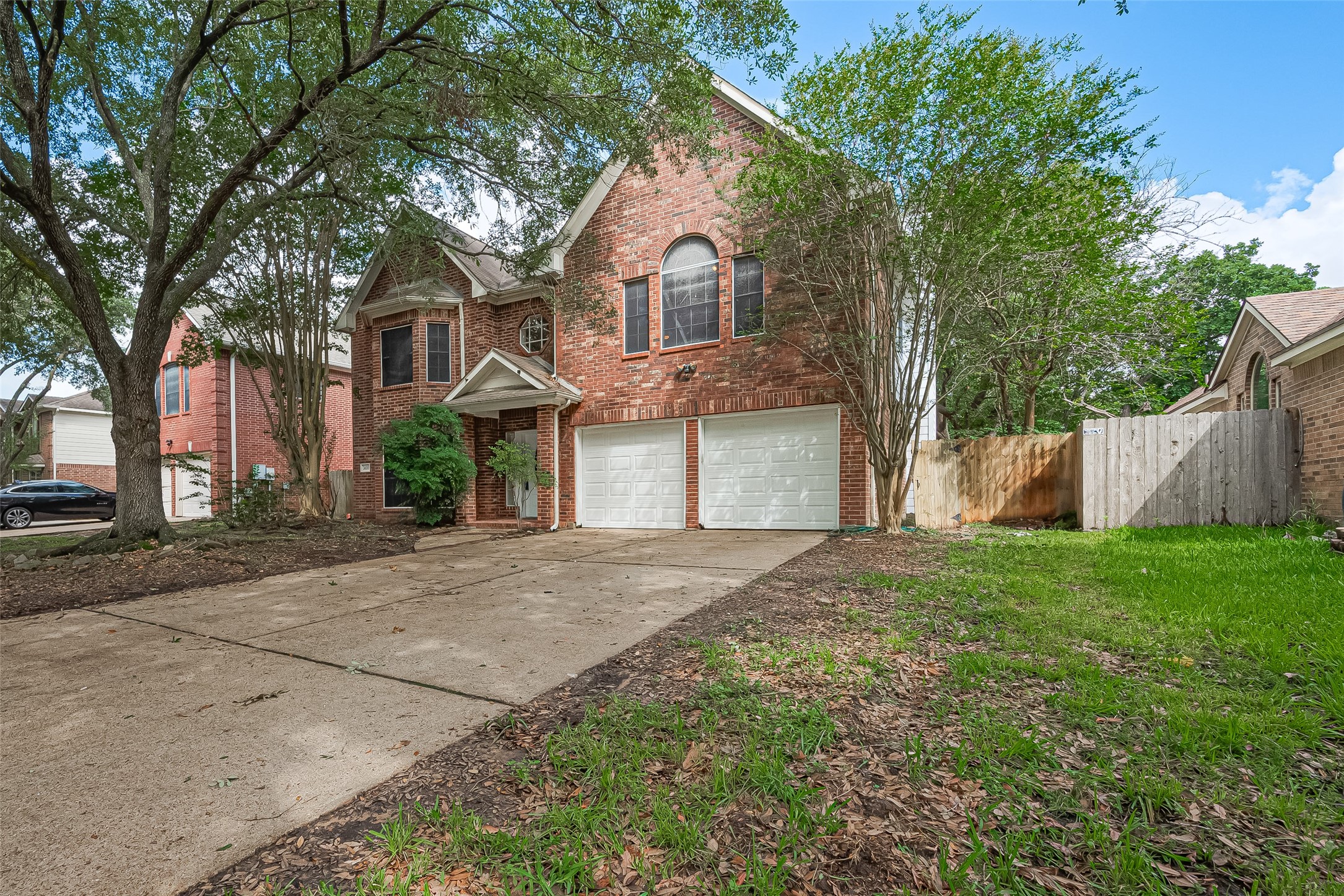 24310 Pepperrell Pl Street Katy, TX 77493 - Photo 2 of 35 a front view of a house with a yard and garage
