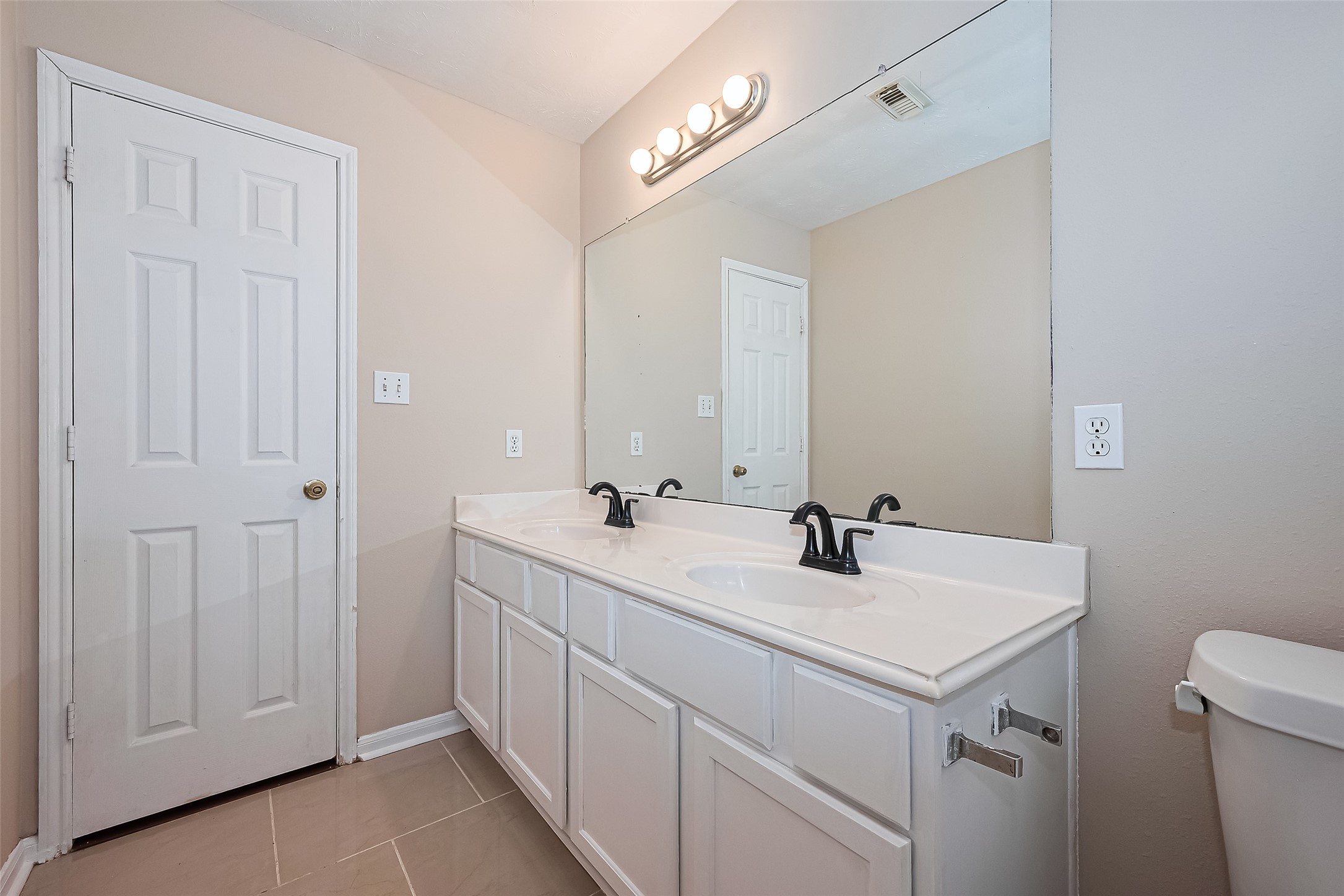 24310 Pepperrell Pl Street Katy, TX 77493 - Photo 22 of 35 a bathroom with a sink and mirror