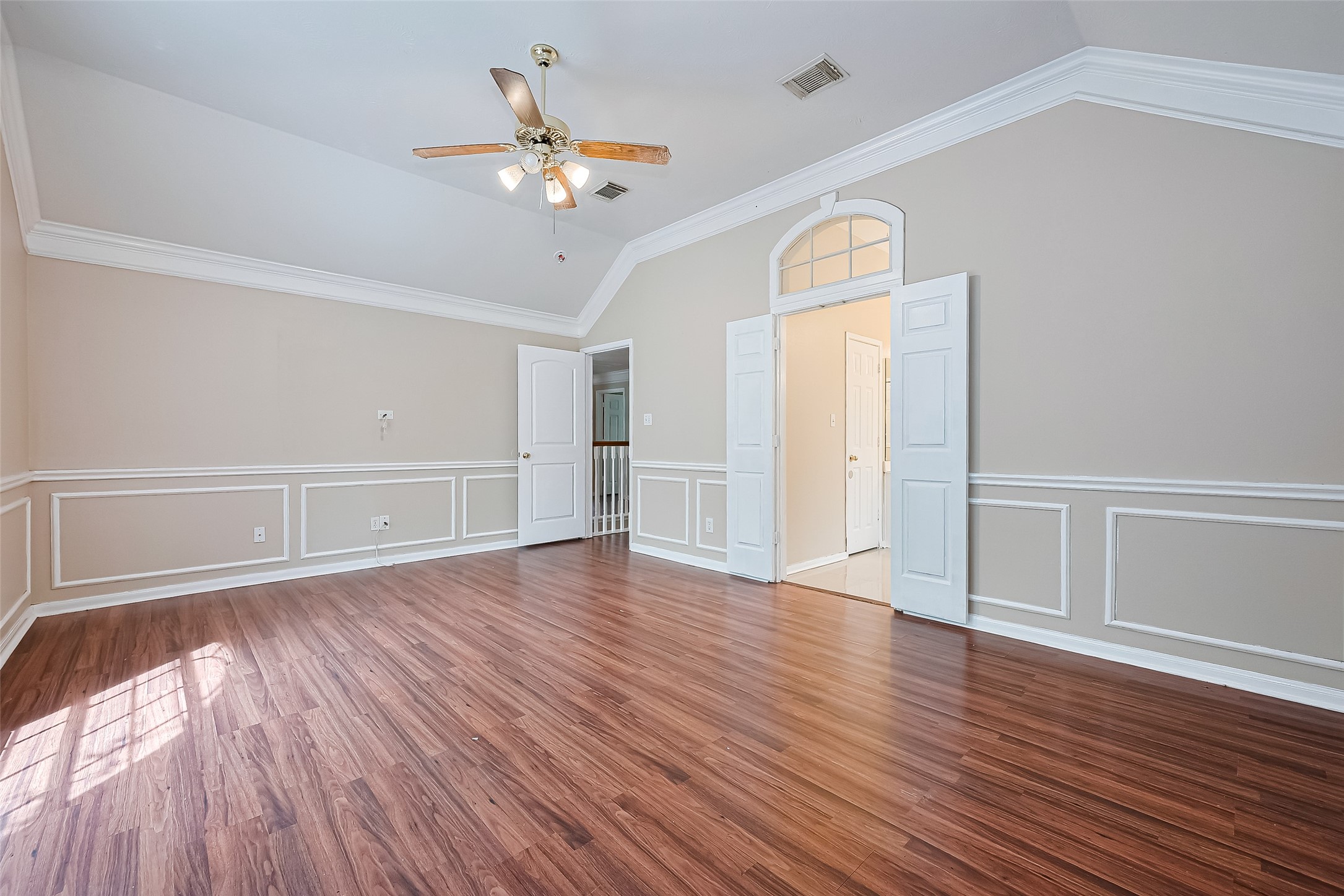 24310 Pepperrell Pl Street Katy, TX 77493 - Photo 26 of 35 a view of an empty room with wooden floor and a window