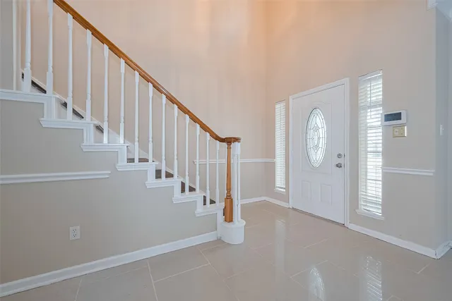 a view of entryway with stairs