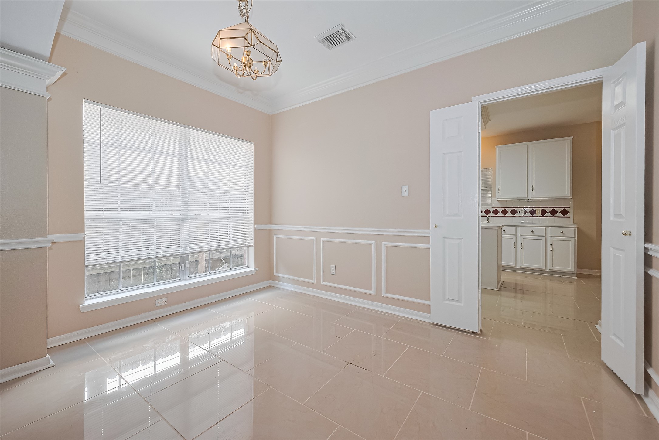 24310 Pepperrell Pl Street Katy, TX 77493 - Photo 5 of 35 a view of an empty room with a window