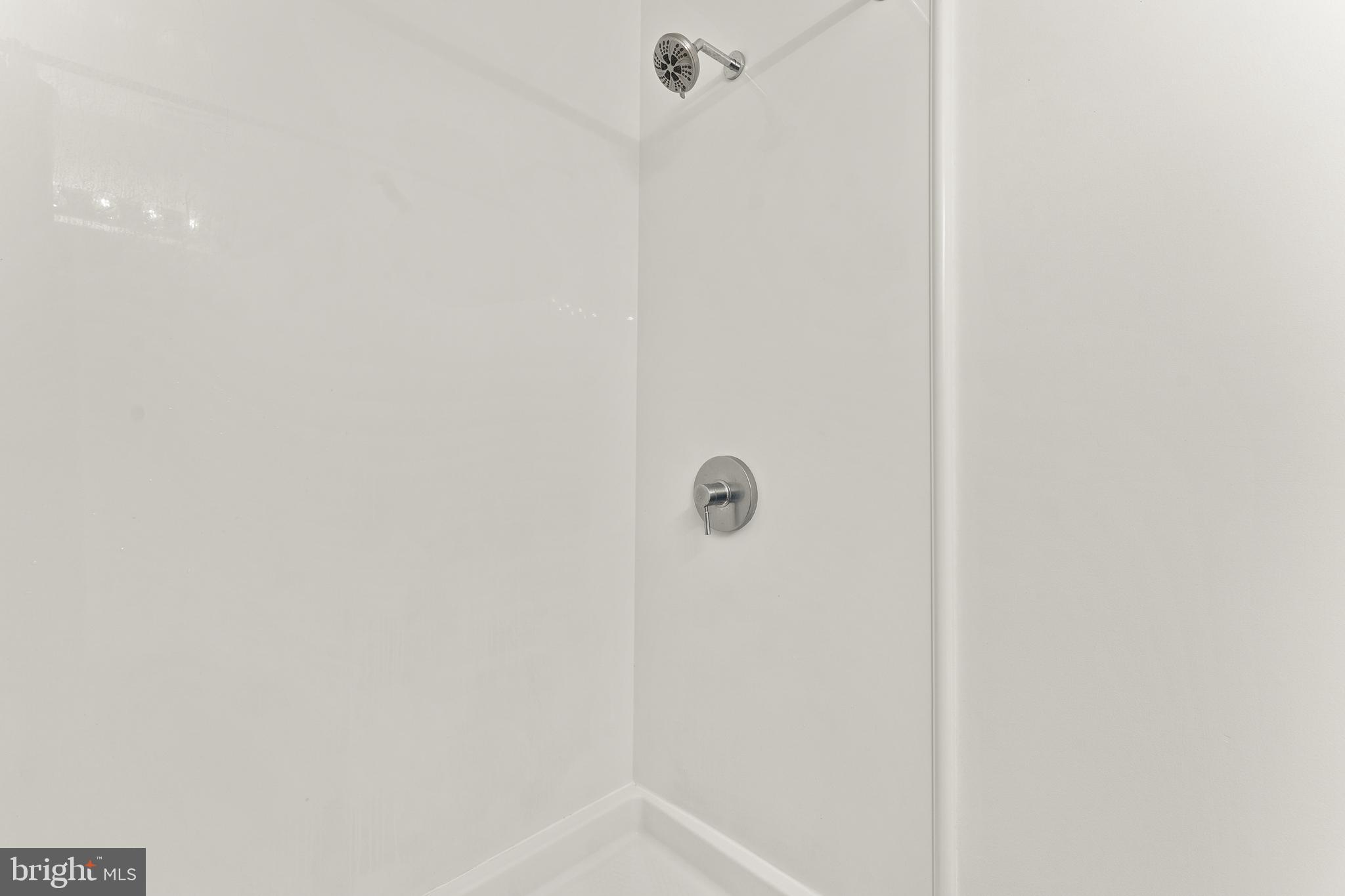 7202 Danny Lane Manassas, VA 20112 - Photo 26 of 54 a bathroom with a shower
